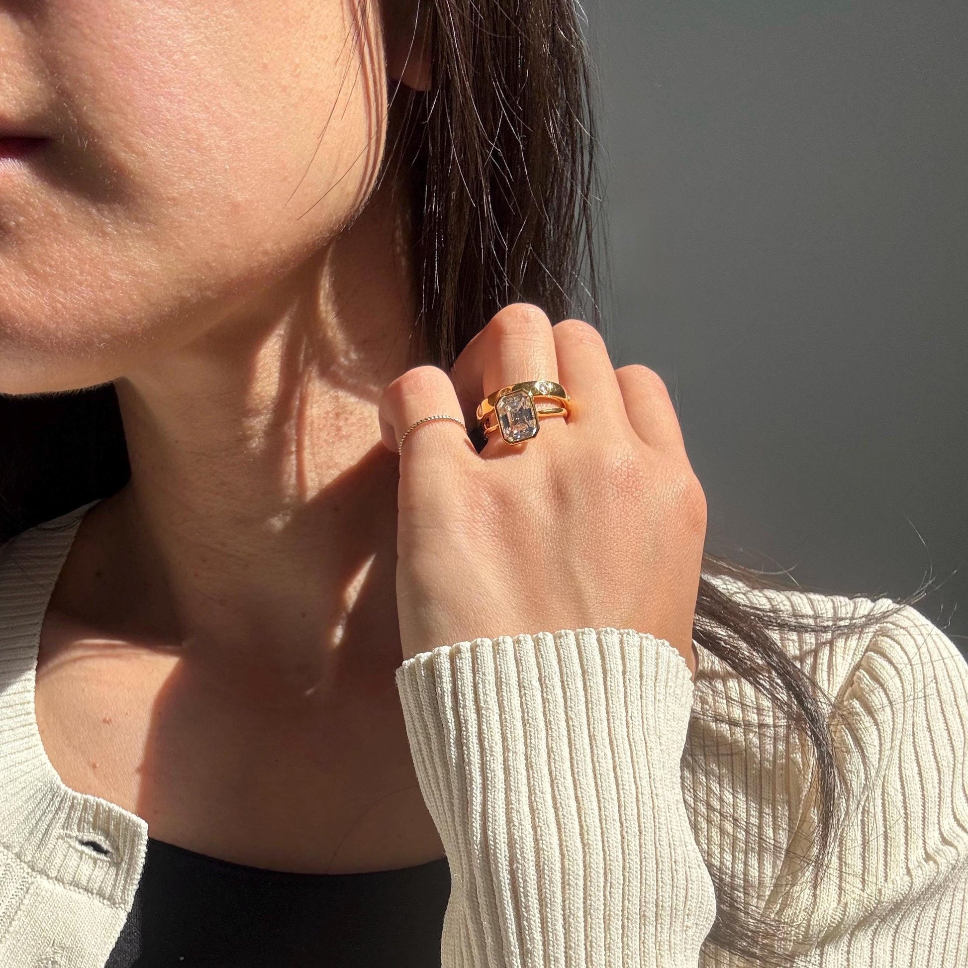 14k Gold Emerald Cut Moissanite Casey Ring: Lightweight Bezel Setting