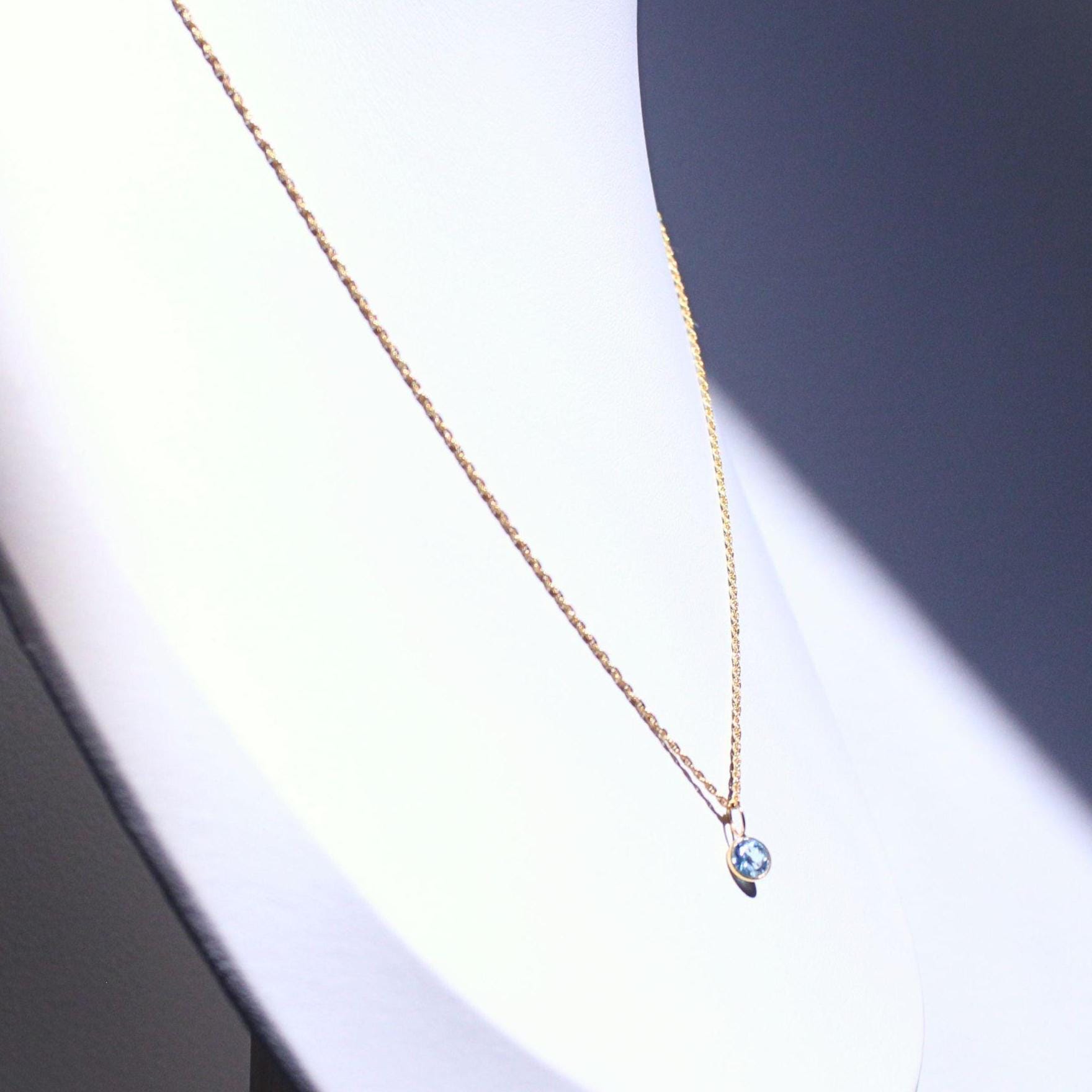 18K Solid Gold Lori Blue Topaz Necklace: Dainty December Birthstone Pendant