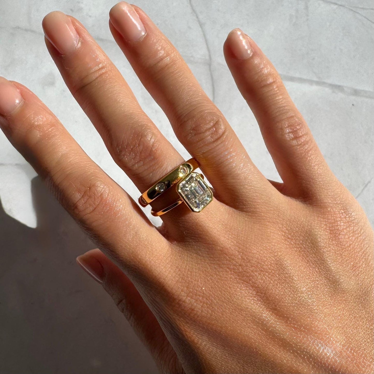 14k Gold Emerald Cut Moissanite Casey Ring: Lightweight Bezel Setting