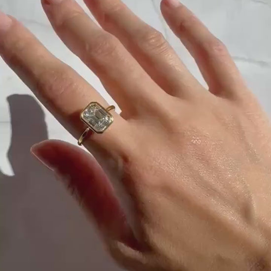 14k Gold Emerald Cut Moissanite Casey Ring: Lightweight Bezel Setting
